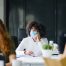 Young people with face masks back on campus amid coronavirus pandemic